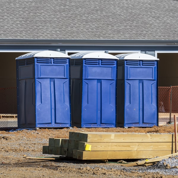 what is the cost difference between standard and deluxe porta potty rentals in Hollister North Carolina